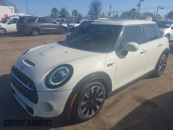 ✅ 2021 MINI Hardtop 4 Door Cooper S • VIN: WMWXU9C00M2P04693 • Lot: 41785185. Listed on IAAI with 57,848 mi. Free auction sales archive from the USA and detailed vehicle history report at DreamBid. Image 17.