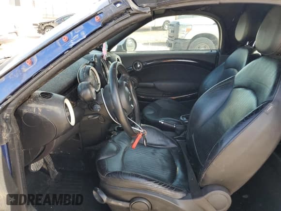 ✅ 2014 MINI Roadster S • VIN: WMWSY3C5XET595324 • Lot: 42704705. Wystawiony na Copart z przebiegiem 102 787 mil. Bezpłatny archiwum sprzedaży aukcyjnych z USA i szczegółowy raport historii pojazdu na DreamBid. Zdjęcie 7.