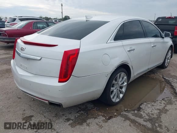 ✅ 2017 Cadillac XTS Luxury • VIN: 2G61M5S33H9121767 • Lot: 43865283. Listed on IAAI with 112,511 mi. Free auction sales archive from the USA and detailed vehicle history report at DreamBid. Image 4.