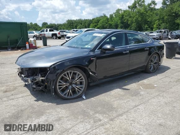 ✅ 2016 Audi A7 Premium Plus • VIN: WAUWGAFC9GN080969 • Лот: 60725745. Опубликован ранее на Copart с пробегом 168 909 миль. Бесплатный доступ к архиву аукционных продаж из США и подробный отчёт об истории автомобиля на DreamBid. Изображение 1.