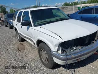 ✅ 1999 Chevrolet Blazer LT • VIN: 1GNDT13W4X2112417 • Lot: 42621928. Wystawiony na IAAI z przebiegiem 74 518 mil. Bezpłatny archiwum sprzedaży aukcyjnych z USA i szczegółowy raport historii pojazdu na DreamBid. Zdjęcie 1.