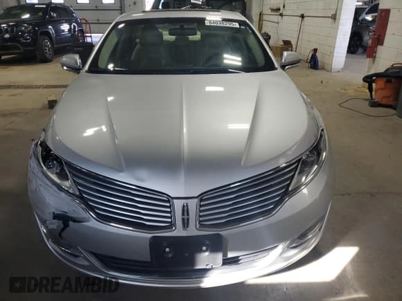 ✅ 2013 Lincoln MKZ • VIN: 3LN6L2G90DR828388 • Lot: 84038295. Wystawiony na Copart z przebiegiem 146 928 mil. Bezpłatny archiwum sprzedaży aukcyjnych z USA i szczegółowy raport historii pojazdu na DreamBid. Zdjęcie 5.