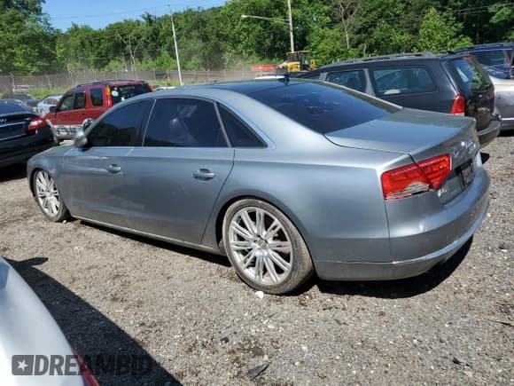 ✅ 2012 Audi A8 • VIN: WAURVAFDXCN001167 • Lot: 57227105. Listed on Copart with 154,409 mi. Free auction sales archive from the USA and detailed vehicle history report at DreamBid. Image 2.