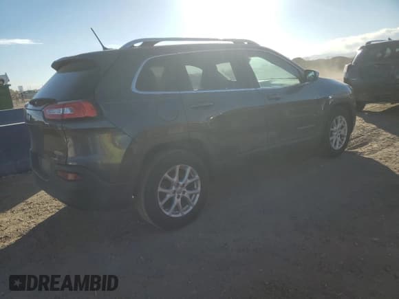 ✅ 2014 Jeep Cherokee Latitude • VIN: 1C4PJLCB9EW212958 • Lot: 82667645. Listed on Copart with 174,188 mi. Free auction sales archive from the USA and detailed vehicle history report at DreamBid. Image 3.