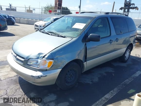 ✅ 1999 Toyota Sienna LE • VIN: 4T3ZF13C5XU099020 • Lot: 41709287. Listed on IAAI with 206,884 mi. Free auction sales archive from the USA and detailed vehicle history report at DreamBid. Image 2.