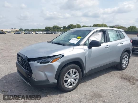 ✅ 2024 Toyota Corolla Cross L • VIN: 7MUAAAAG2RV090223 • Lot: 41869085. Listed on IAAI with 79,605 mi. Free auction sales archive from the USA and detailed vehicle history report at DreamBid. Image 2.