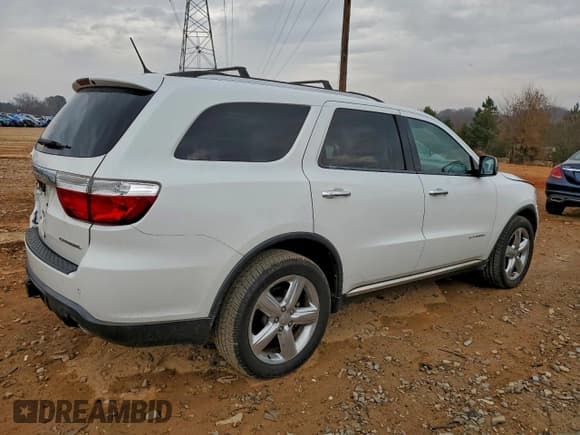 ✅ 2013 Dodge Durango Citadel • VIN: 1C4SDJET5DC561787 • Lot: 94086915. Listed on Copart with 166,148 mi. Free auction sales archive from the USA and detailed vehicle history report at DreamBid. Image 3.
