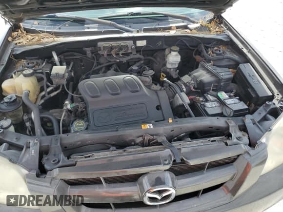 ✅ 2006 Mazda Tribute S • VIN: 4F2YZ04176KM25076 • Лот: 53693245. Опубликован ранее на Copart с пробегом 167 072 миль. Бесплатный доступ к архиву аукционных продаж из США и подробный отчёт об истории автомобиля на DreamBid. Изображение 12.