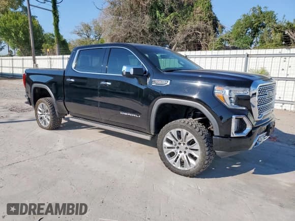 ✅ 2021 GMC Sierra 1500 Denali • VIN: 3GTU9FEL2MG304123 • Лот: 84589165. Опубликован ранее на Copart с пробегом 71 199 миль. Бесплатный доступ к архиву аукционных продаж из США и подробный отчёт об истории автомобиля на DreamBid. Изображение 4.
