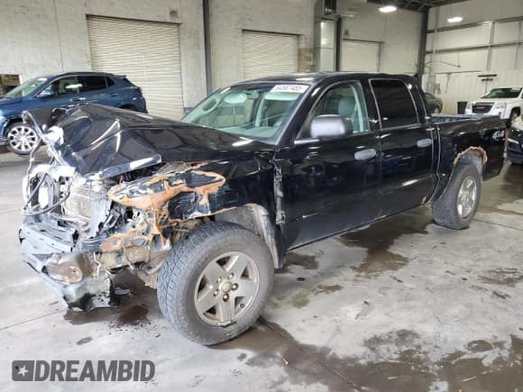 ✅ 2005 Dodge Dakota SLT • VIN: 1D7HW48N25S120408 • Lot: 64587485. Wystawiony na Copart z przebiegiem 343 505 mil. Bezpłatny archiwum sprzedaży aukcyjnych z USA i szczegółowy raport historii pojazdu na DreamBid. Zdjęcie 1.