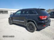 ✅ 2013 Jeep Grand Cherokee Laredo • VIN: 1C4RJFAG6DC635800 • Lot: 93049045. Listed on Copart with 145,660 mi. Free auction sales archive from the USA and detailed vehicle history report at DreamBid. Image 2.
