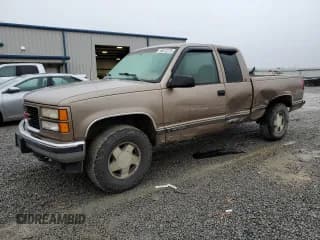 ✅ 1997 GMC Sierra 1500 • VIN: 2GTEK19R1V1566851 • Lot: 90412275. Listed on Copart with 283,856 mi. Free auction sales archive from the USA and detailed vehicle history report at DreamBid. Image 1.