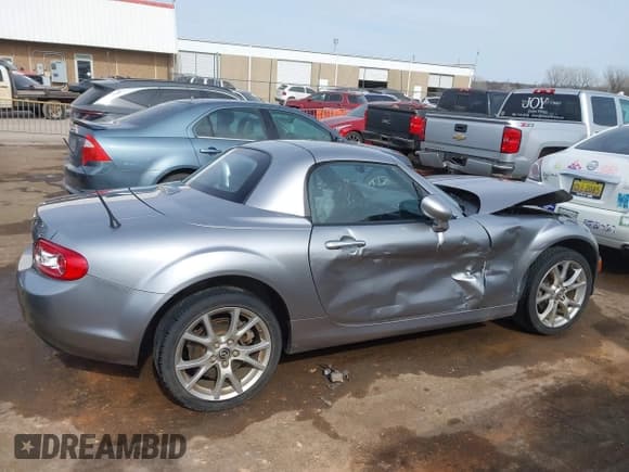 ✅ 2013 Mazda MX-5 Miata Grand Touring • VIN: JM1NC2PF4D0230567 • Лот: 41605492. Опубликован ранее на IAAI с пробегом 133 908 миль. Бесплатный доступ к архиву аукционных продаж из США и подробный отчёт об истории автомобиля на DreamBid. Изображение 13.