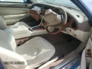 ✅ 1998 Jaguar XK • VIN: SAJJGAED3AR025857 • Lot: 84219455. Listed on Copart with Not provided. Free auction sales archive from the USA and detailed vehicle history report at DreamBid. Image 8.