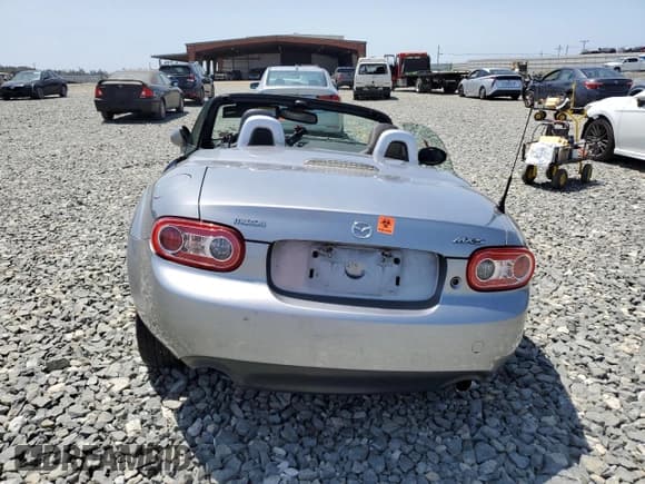 ✅ 2010 Mazda MX-5 Miata Grand Touring • VIN: JM1NC2FF5A0205190 • Lot: 61372455. Wystawiony na Copart z przebiegiem 147 852 mil. Bezpłatny archiwum sprzedaży aukcyjnych z USA i szczegółowy raport historii pojazdu na DreamBid. Zdjęcie 6.
