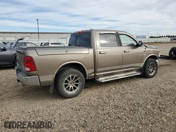 ✅ 2009 Dodge 1500 Laramie • VIN: 1D3HV13T59J531497 • Lot: 89547165. Listed on Copart with 112,503 mi. Free auction sales archive from the USA and detailed vehicle history report at DreamBid. Image 3.