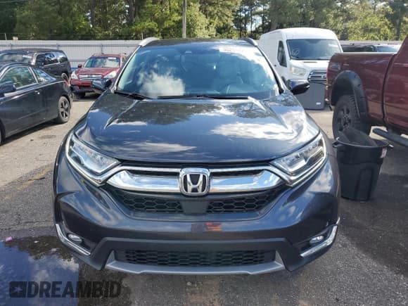 ✅ 2018 Honda CR-V Touring • VIN: 7FARW1H97JE045135 • Lot: 90251425. Listed on Copart with 62,197 mi. Free auction sales archive from the USA and detailed vehicle history report at DreamBid. Image 5.