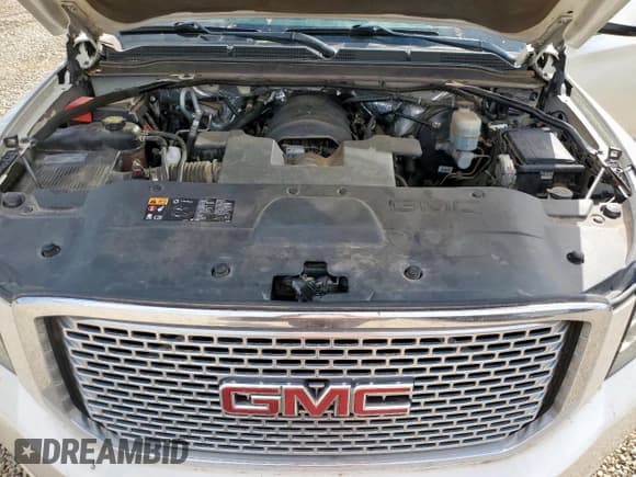 ✅ 2015 GMC Yukon XL Denali • VIN: 1GKS2JKJXFR646962 • Лот: 86057485. Опубликован ранее на Copart с пробегом 164 911 миль. Бесплатный доступ к архиву аукционных продаж из США и подробный отчёт об истории автомобиля на DreamBid. Изображение 12.