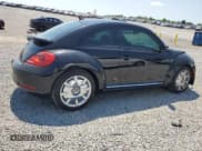 ✅ 2016 Volkswagen Beetle SE • VIN: 3VWJ17ATXGM623892 • Lot: 69116435. Listed on Copart with 89,052 mi. Free auction sales archive from the USA and detailed vehicle history report at DreamBid. Image 3.