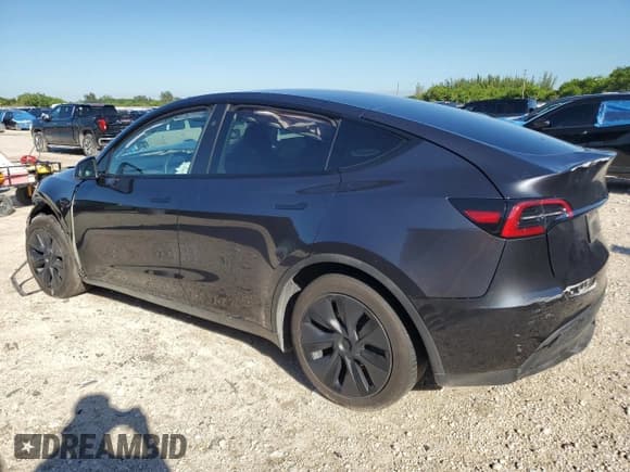 ✅ 2025 Tesla Model Y Long Range • VIN: 7SAYGDED2SF245519 • Lot: 86227805. Listed on Copart with 28,470 mi. Free auction sales archive from the USA and detailed vehicle history report at DreamBid. Image 2.