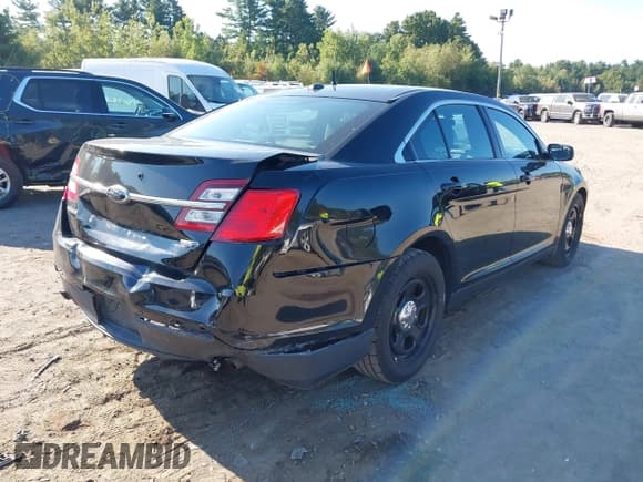 ✅ 2014 Ford Police Interceptor • VIN: 1FAHP2MK1EG185332 • Lot: 43109001. Listed on IAAI with 106,038 mi. Free auction sales archive from the USA and detailed vehicle history report at DreamBid. Image 4.