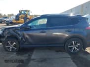 ✅ 2018 Toyota RAV4 XLE • VIN: 2T3RFREV0JW750395 • Лот: 43690716. Опубликован ранее на IAAI с пробегом 79 460 миль. Бесплатный доступ к архиву аукционных продаж из США и подробный отчёт об истории автомобиля на DreamBid. Изображение 14.