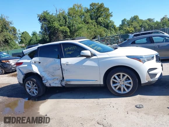 ✅ 2021 Acura RDX • VIN: 5J8TC2H32ML017256 • Lot: 43153555. Listed on IAAI with 61,756 mi. Free auction sales archive from the USA and detailed vehicle history report at DreamBid. Image 13.