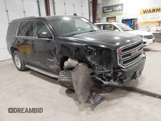 ✅ 2015 GMC Yukon SLT • VIN: 1GKS2BKC2FR509828 • Lot: 43367994. Listed on IAAI with 215,401 mi. Free auction sales archive from the USA and detailed vehicle history report at DreamBid. Image 1.