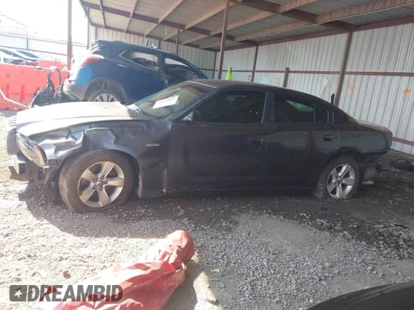 2013 Dodge Charger SE z VIN 2C3CDXBGXDH636354, wystawiony jako IAAI lot #43373664 z przebiegiem 166 848 mil mil oraz . Historia ofert i sprzedaży dostępna na DreamBid. Obrazek 15.