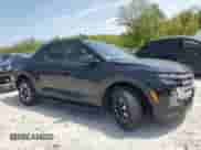 2025 Hyundai Santa Cruz SEL with VIN 5NTJBDDE9SH137120, listed as a Copart auction lot 56850295 with 1,693 mi miles and Salvage title. Bid and sale history available at DreamBid. Image 4.