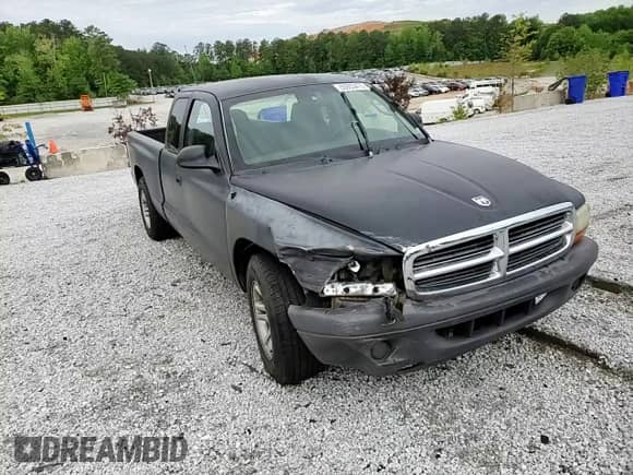 2004 Dodge Dakota z VIN 1D7GL12K84S586604, wystawiony jako Copart lot #55933475 z przebiegiem 90 842 mil mil oraz Szkoda całkowita • Salvage title. Historia ofert i sprzedaży dostępna na DreamBid. Obrazek 13.