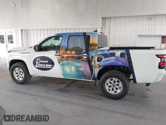 ✅ 2025 Nissan Frontier S • VIN: 1N6ED1EKXSN601669 • Lot: 42171057. Listed on IAAI with 801 mi. Free auction sales archive from the USA and detailed vehicle history report at DreamBid. Image 15.