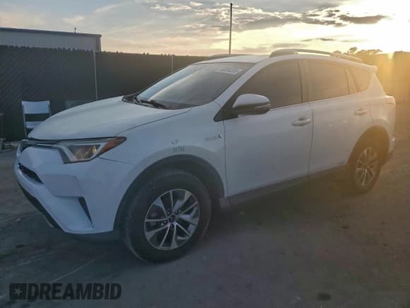✅ 2018 Toyota RAV4 Hybrid XLE • VIN: JTMRJREVXJD192048 • Lot: 93354285. Listed on Copart with 110,761 mi. Free auction sales archive from the USA and detailed vehicle history report at DreamBid. Image 1.