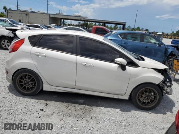 ✅ 2018 Ford Fiesta ST • VIN: 3FADP4GX4JM132190 • Lot: 69024145. Listed on Copart with 61,976 mi. Free auction sales archive from the USA and detailed vehicle history report at DreamBid. Image 4.