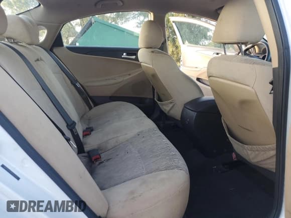 ✅ 2013 Hyundai Sonata GLS • VIN: 5NPEB4AC9DH562570 • Lot: 77090234. Listed on Copart with 106,859 mi. Free auction sales archive from the USA and detailed vehicle history report at DreamBid. Image 7.