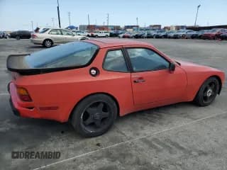 ✅ 1985 Porsche 944 • VIN: WP0AA0942FN454415 • Лот: 51178705. Опубликован ранее на Copart с пробегом 106 725 миль. Бесплатный доступ к архиву аукционных продаж из США и подробный отчёт об истории автомобиля на DreamBid. Изображение 3.