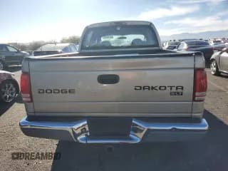 ✅ 2003 Dodge Dakota SLT • VIN: 1D7HG48N43S239393 • Lot: 82178244. Wystawiony na Copart z przebiegiem 246 860 mil. Bezpłatny archiwum sprzedaży aukcyjnych z USA i szczegółowy raport historii pojazdu na DreamBid. Zdjęcie 6.