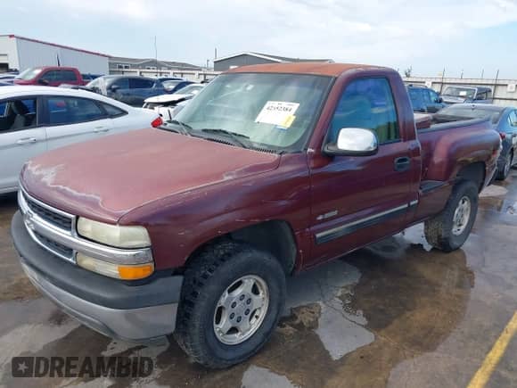 2002 Chevrolet Silverado 1500 LS z VIN 1GCEK14V02Z331249, wystawiony jako IAAI lot #42352384 z przebiegiem 232 697 mil mil oraz . Historia ofert i sprzedaży dostępna na DreamBid. Obrazek 22.