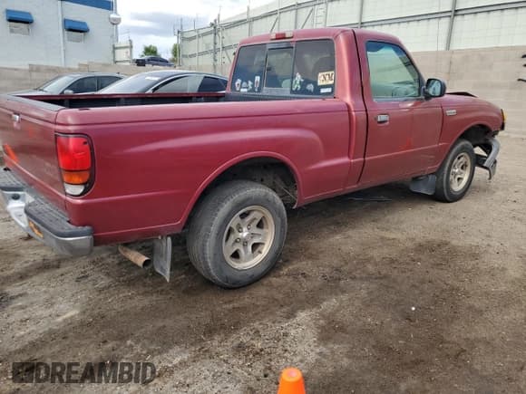 ✅ 1999 Mazda B-Series SX • VIN: 4F4YR12C4XTM17773 • Lot: 67146255. Listed on Copart with 149,171 mi. Free auction sales archive from the USA and detailed vehicle history report at DreamBid. Image 3.