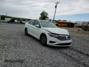 ✅ 2019 Volkswagen Jetta S • VIN: 3VWC57BU9KM006514 • Lot: 57563825. Listed on Copart with 71,346 mi. Free auction sales archive from the USA and detailed vehicle history report at DreamBid. Image 13.