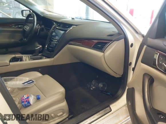 ✅ 2014 Cadillac CTS RWD • VIN: 1G6AP5SX4E0123768 • Lot: 41581568. Listed on IAAI with 69,442 mi. Free auction sales archive from the USA and detailed vehicle history report at DreamBid. Image 5.