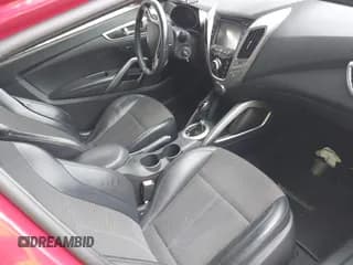 ✅ 2013 Hyundai Veloster w/Gray Int • VIN: KMHTC6AD4DU092345 • Lot: 41382227. Wystawiony na IAAI z przebiegiem 134 621 mil. Bezpłatny archiwum sprzedaży aukcyjnych z USA i szczegółowy raport historii pojazdu na DreamBid. Zdjęcie 5.