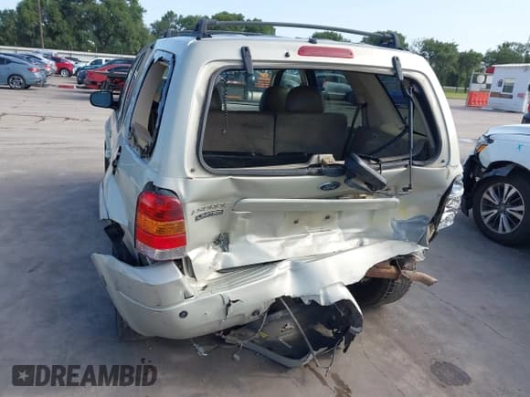 ✅ 2003 Ford Escape Limited • VIN: 1FMCU94103KD47888 • Lot: 42644120. Listed on IAAI with 247,024 mi. Free auction sales archive from the USA and detailed vehicle history report at DreamBid. Image 6.