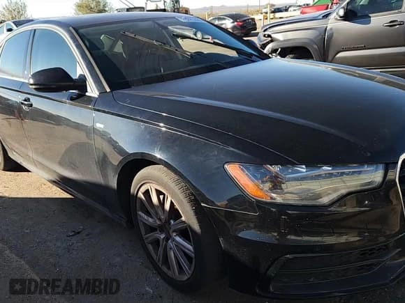 ✅ 2014 Audi A6 Prestige • VIN: WAUHMAFC3EN011077 • Лот: 89889305. Опубликован ранее на Copart с пробегом 167 776 миль. Бесплатный доступ к архиву аукционных продаж из США и подробный отчёт об истории автомобиля на DreamBid. Изображение 13.