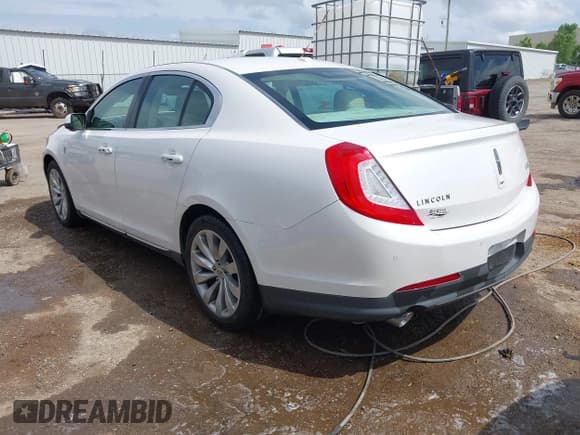 ✅ 2014 Lincoln MKS • VIN: 1LNHL9DK7EG601720 • Lot: 42464979. Listed on IAAI with 58,163 mi. Free auction sales archive from the USA and detailed vehicle history report at DreamBid. Image 3.