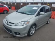 ✅ 2007 Mazda 5 Touring • VIN: JM1CR29L370150710 • Lot: 38714762. Listed on IAAI with 153,751 mi. Free auction sales archive from the USA and detailed vehicle history report at DreamBid. Image 2.