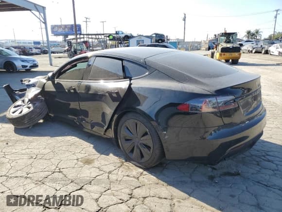 ✅ 2022 Tesla Model S • VIN: 5YJSA1E57NF464542 • Lot: 85185455. Listed on Copart with 32,856 mi. Free auction sales archive from the USA and detailed vehicle history report at DreamBid. Image 2.