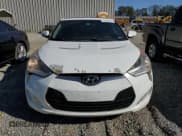 ✅ 2013 Hyundai Veloster w/Gray Int • VIN: KMHTC6AD6DU154098 • Lot: 77260374. Wystawiony na Copart z przebiegiem 159 049 mil. Bezpłatny archiwum sprzedaży aukcyjnych z USA i szczegółowy raport historii pojazdu na DreamBid. Zdjęcie 5.