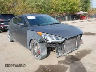2014 Hyundai Veloster Turbo with VIN KMHTC6AE8EU185735, listed as a IAAI auction lot 43430533 with 120,337 mi miles and . Bid and sale history available at DreamBid. Image 1.