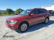 ✅ 2018 Volkswagen Tiguan S • VIN: 3VV0B7AX9JM078596 • Lot: 82460305. Listed on Copart with 127,154 mi. Free auction sales archive from the USA and detailed vehicle history report at DreamBid. Image 1.